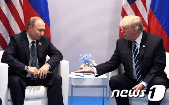 블라디미르 푸틴 러시아 대통령(왼쪽)과 도널드 트럼프 미국 대통령. / AFP=뉴스1